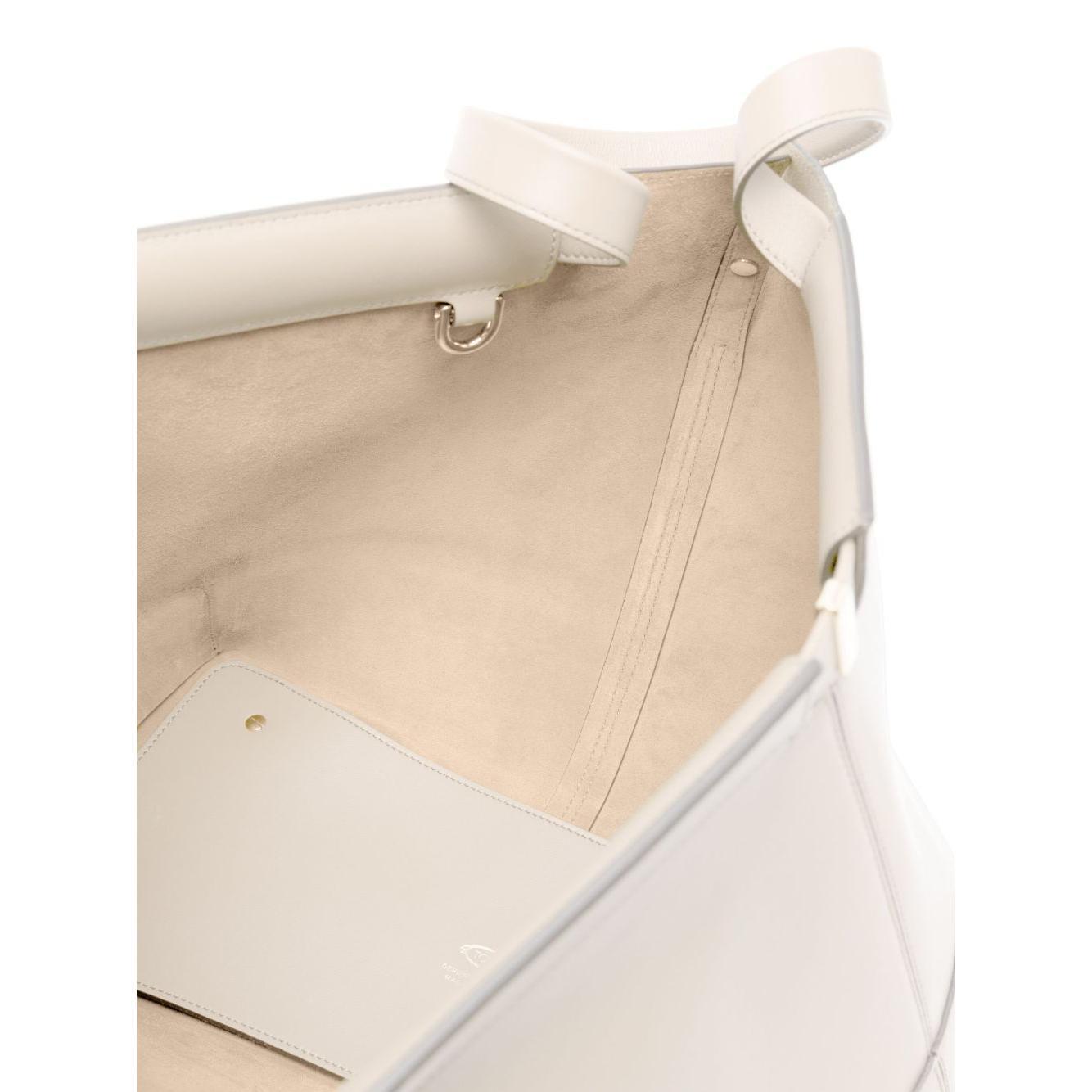 Front view with bag zipped and handles upright.