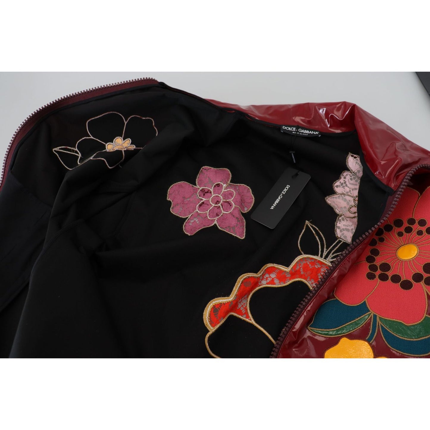 Dolce & Gabbana Maroon Floral Full Zip Polyester Women Jacket1728,67345645728,Clothing,Dolce & Gabbana,IT40|S,Jackets & Coats - Clothing,Jackets & Coats - Women - Clothing,Maroon,Material: 60% Polyester 40% Polyurethane,New with tags,Rain Coats - Jackets