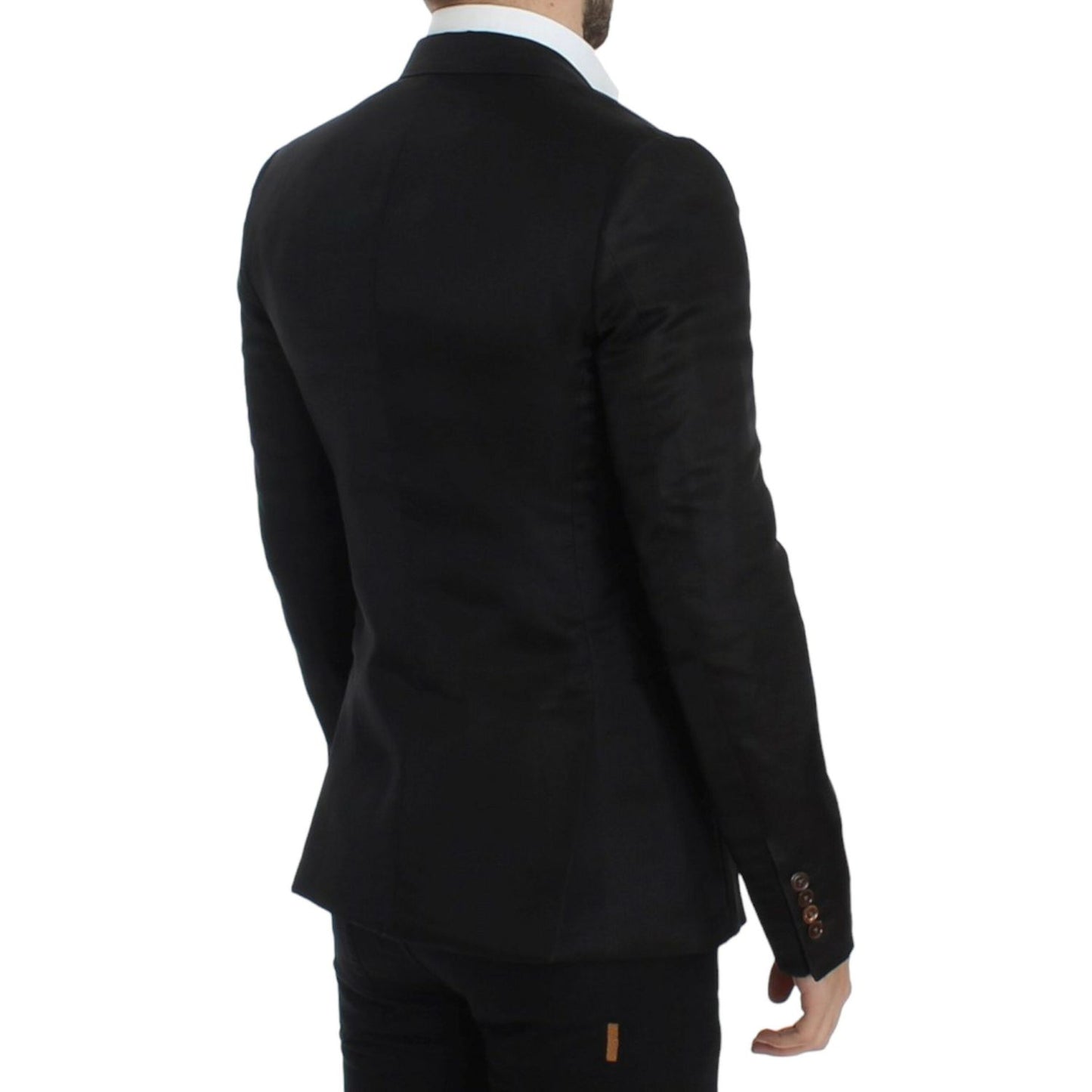 Back view of a man wearing a Dolce & Gabbana black silk slim fit blazer, showcasing its stylish design and fit.