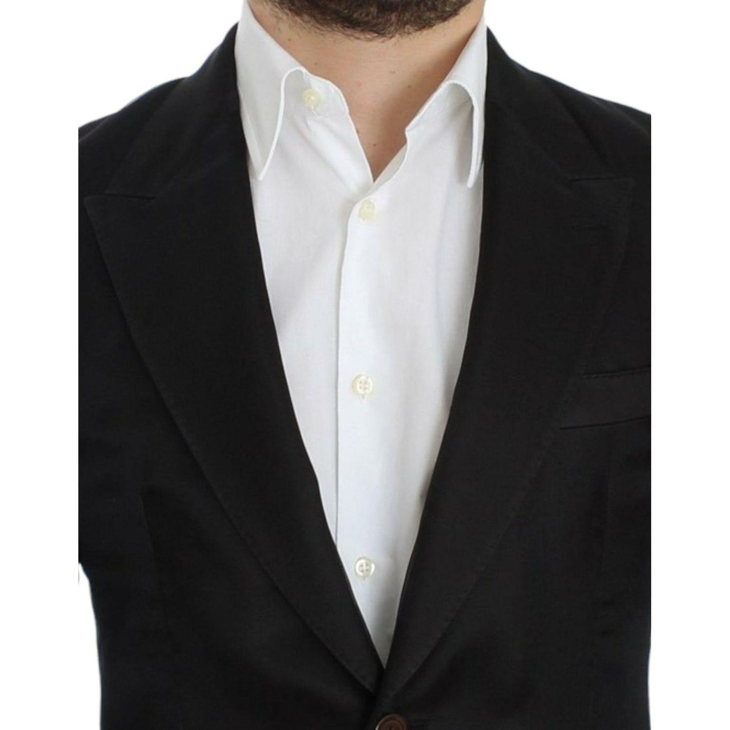 Dolce & Gabbana black silk slim fit blazer worn over a white shirt, showcasing a stylish slim fit design.