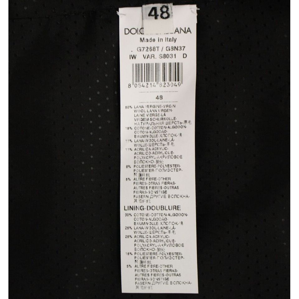 Dolce Gabbana gray wool vest care label showing composition and sizing information, made in Italy.