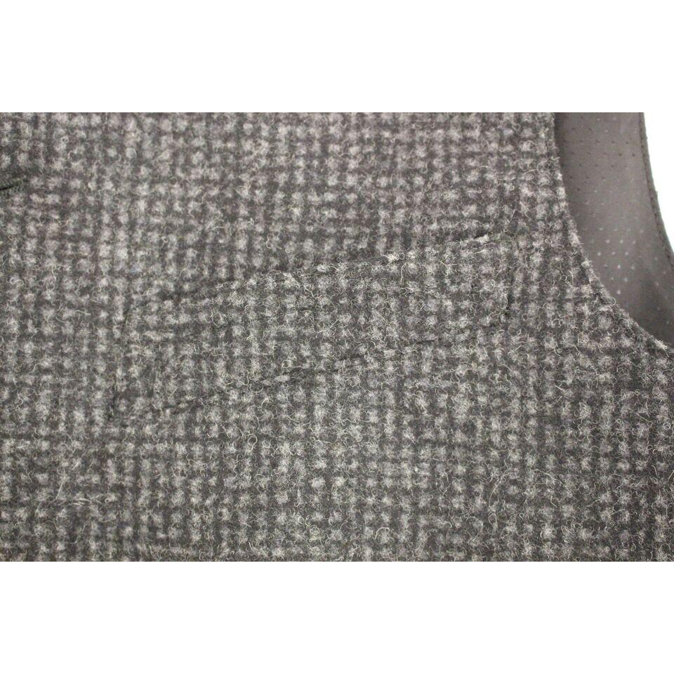 Dolce Gabbana gray wool vest close-up texture of the fabric and pattern details, showcasing high-quality craftsmanship.