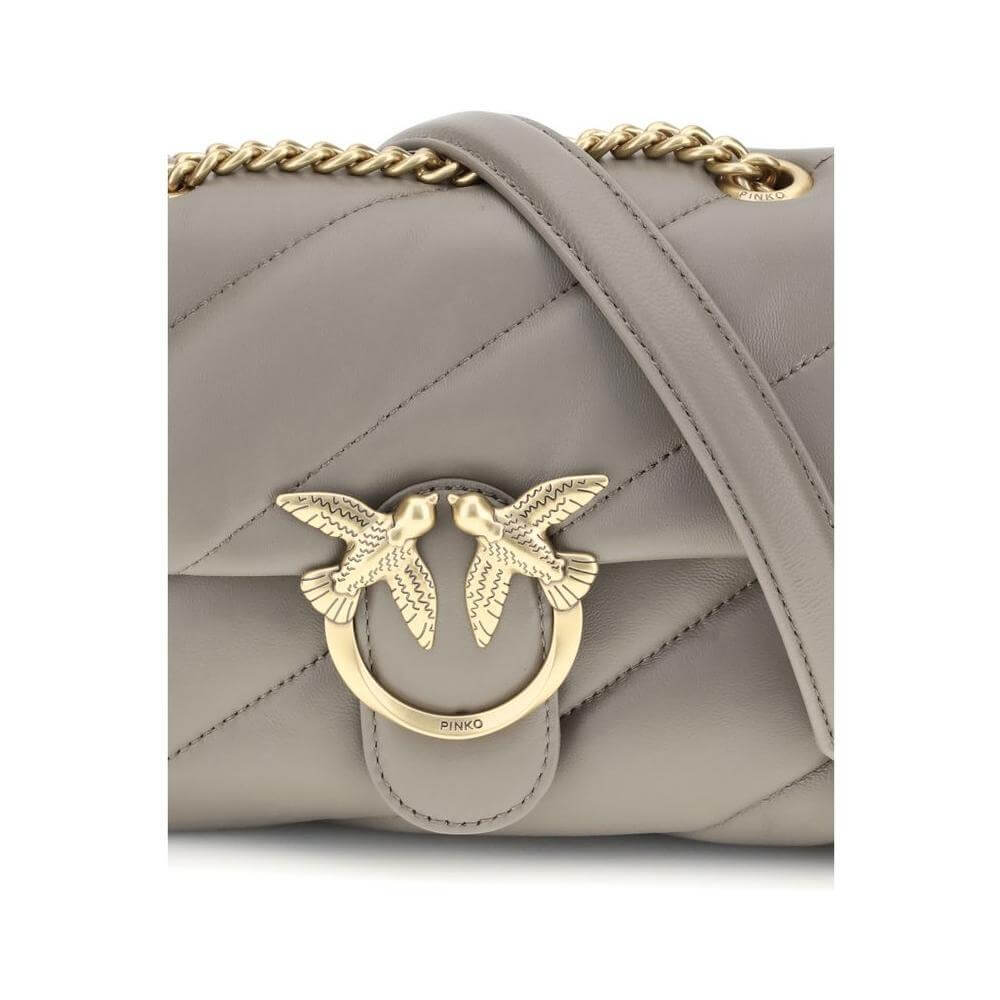 Front view with bag zipped and handles upright.
